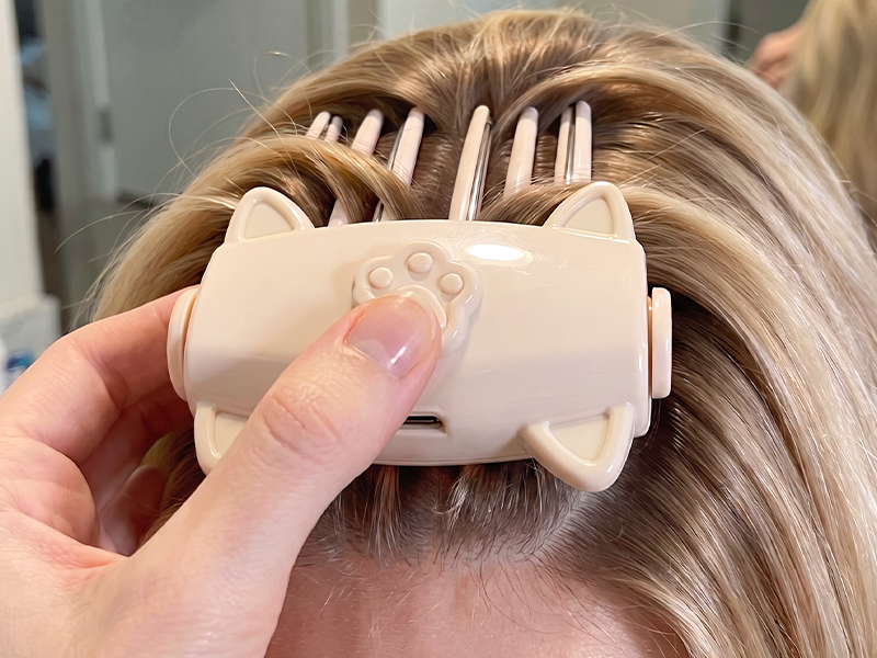 Clip the root lifter at the hair roots
