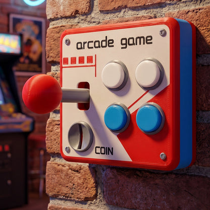 Dekorativt strömbrytarskydd med arkadjoystick